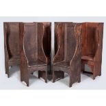 A SET OF SIX 20TH CENTURY FIRE SIDE SETTLE CHAIRS, of various woods, each with a panel framed high