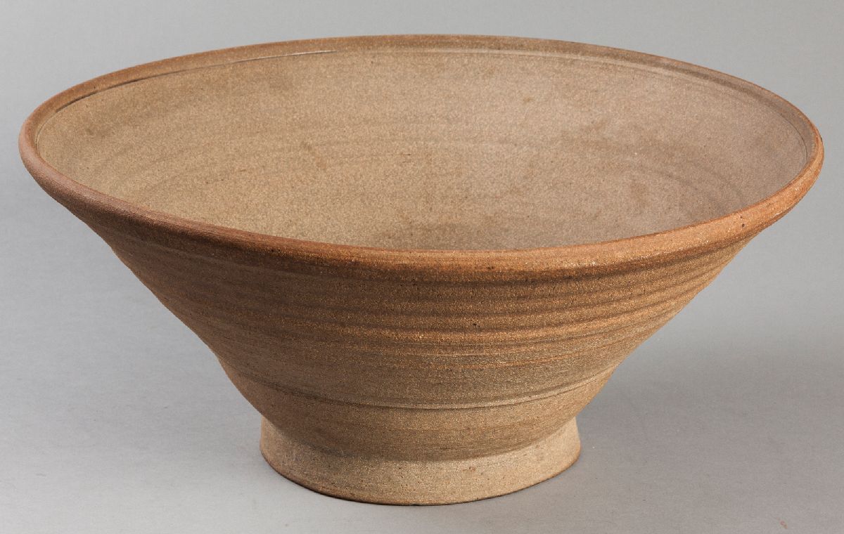 TIM MORRIS (SOUTH AFRICAN: 1941 - 1990), stoneware bowl, well with blue glazed ground and brown