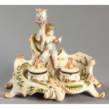 A 19TH CENTURY CONTINENTAL INKSTAND, Circa 1870, with cherub holding a candlestick and two