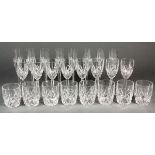 A SUITE OF WATERFORD "MARQUIS" PATTERN DRINKING GLASSES, comprising: of 9 champagne flutes, 8