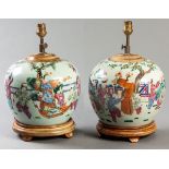 A PAIR OF EARLY 19TH CENTURY CHINESE FAMILLE ROSE GINGER JARS, Circa 1825, decorated with mothers
