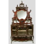 AN EARLY 20TH CENTURY MAHOGANY AND EBONIZED DISPLAY CABINET, the upper-section with floral carved
