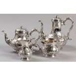 A FOUR PIECE SILVERPLATE TEA AND COFFEE SERVICE, comprising: of a teapot, coffee pot, creamer and
