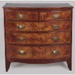 A GEORGE III FLAME MAHOGANY BOW-FRONTED CHEST OF DRAWERS, the cross-banded top above two short and