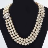 A THREE TIER PEARL NECKLACE, of approximately 6mm each, each string composed of 44, 48 and 50