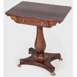 AN EARLY VICTORIAN MAHOGANY SIDE TABLE, the rectangular top above a single drawer and standing ona