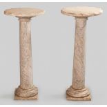 A PAIR OF ITALIAN MARBLE COLUMNS OF DORIC DESIGN, standing on square bases with circular faceted