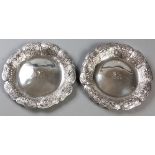 A PAIR OF GEORGE IV SILVER SALVERS, LONDON 1824, EDWARD FARRELL, with a serpentine border, fold-over