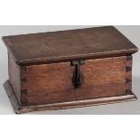 A BOER WAR COROMANDEL SATINWOOD BOX, CIRCA 1902, the hinged rectangular top with an iron locking