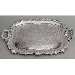 A SILVERPLATE TWIN-HANDLE RECTANGULAR TRAY, with a shell and scroll embossed border, the twin