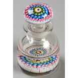 A WHITEFRIARS MILLEFIORI INKWELL, radiating outward from a white centre cane with a white pentagon