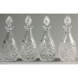 A COLLECTION OF FOUR BRIERLEY CRYSTAL DECANTERS, the removable stoppers with diamond and hobnail