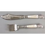A PAIR OF SILVERPLATE AND MOTHER-OF-PEARL FISH SERVERS, the mother-of-pearl handles with an embossed