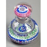 A WHITEFRIARS MILLEFIORI INKWELL, radiating outward from a blue centre cane with a blue pentagon