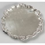 AN EDWARDIAN SILVER SALVER, SHEFFIELD 1902, MAPPIN BROTHERS, wavy rim with applied shell and swag