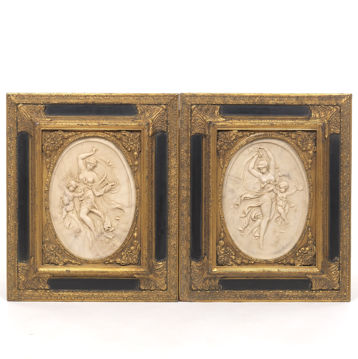 Two French Stone Cameo Oval Plaques in Fancy Frames, T.P. Danbiene Paris 1889
