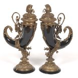 Pair of Renaissance Revival Castilian Porcelain and Bronze Horn Garnitures