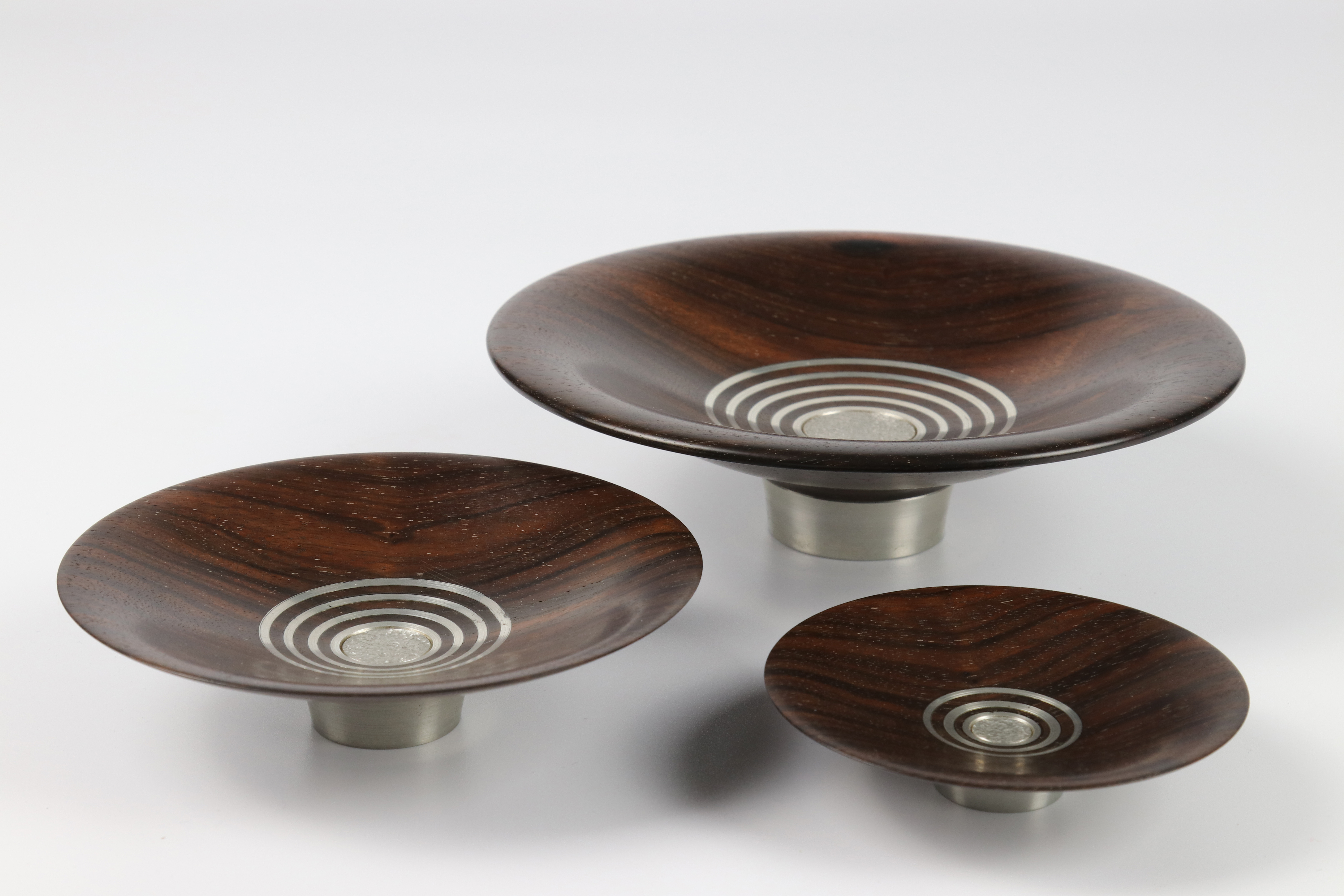 John Wessels (South Africa) striped ebony and pewter nest of three bowls 5x15, 3x13 and 2x8cm. - Image 2 of 5