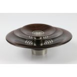 John Wessels (South Africa) striped ebony and pewter nest of three bowls 5x15, 3x13 and 2x8cm.