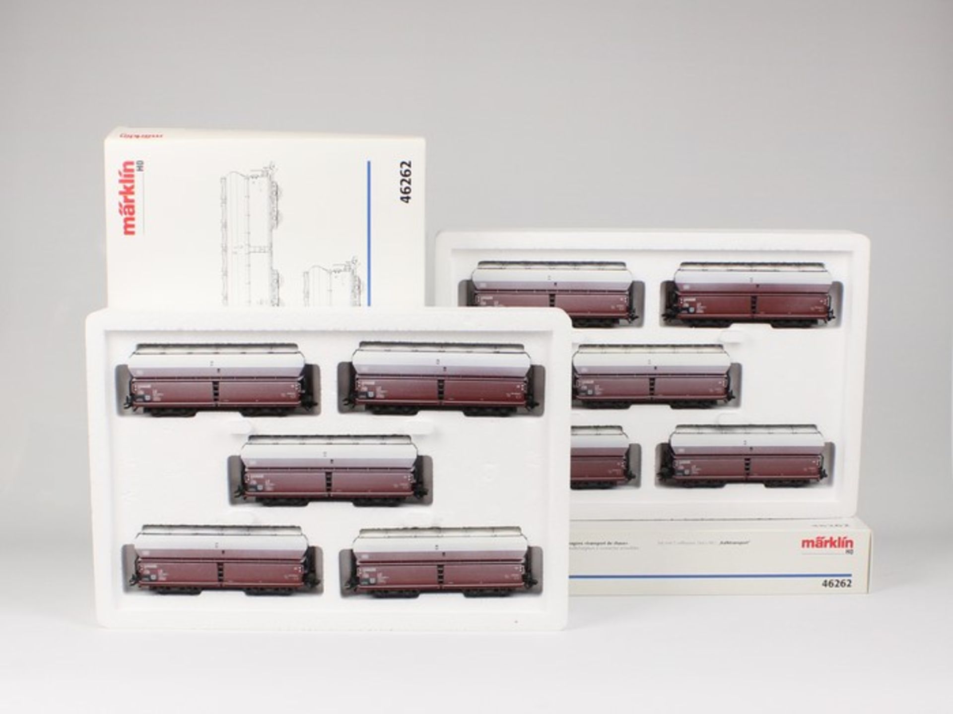 Märklin - Eisenbahn2x Wagenset 46262, Kalktransport, je 5 Selbstentladewagen mit Klappdeckel, OK,