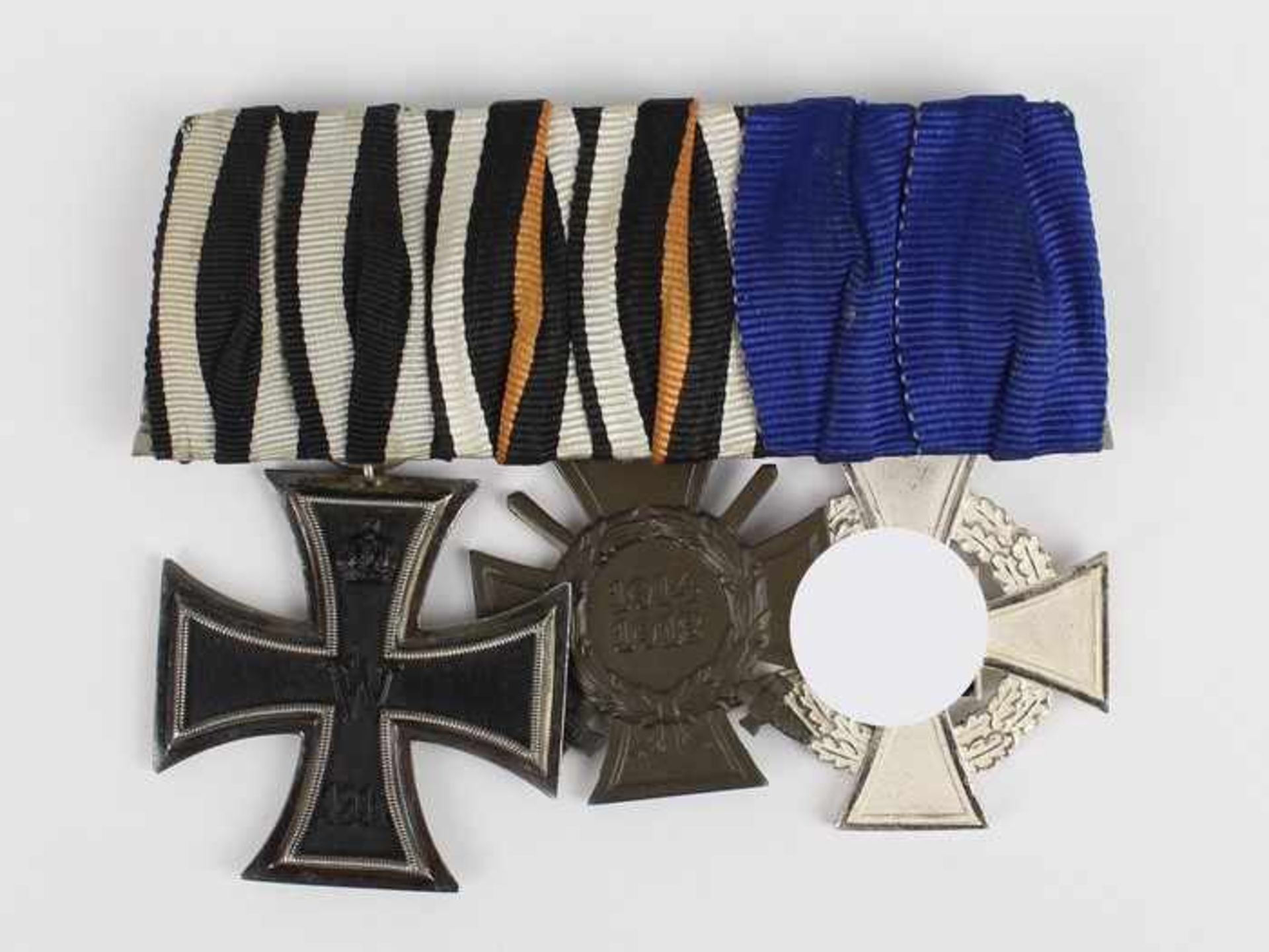 Ordensspange -1.WK/3.Reichm. 3x Abzeichen, 1x Eisernes Kreuz 2.Klasse 1914, 1x Weltkriegs-Ehrenkreuz