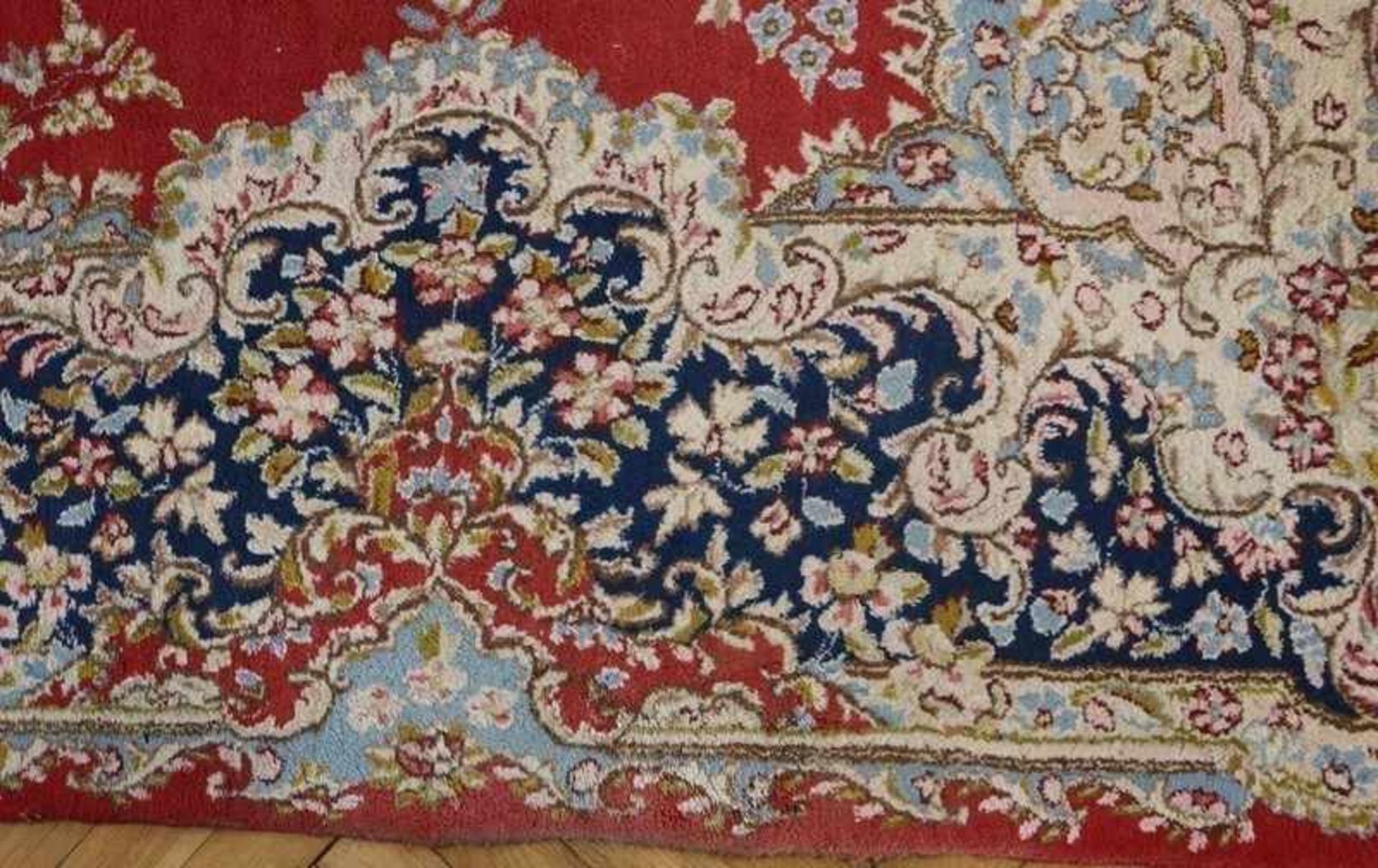 OrientteppichPersien, Kirman, Baumwolle/Wolle, rotgrundiges Feld mit Sternmedaillon, geschweifte - Bild 5 aus 6