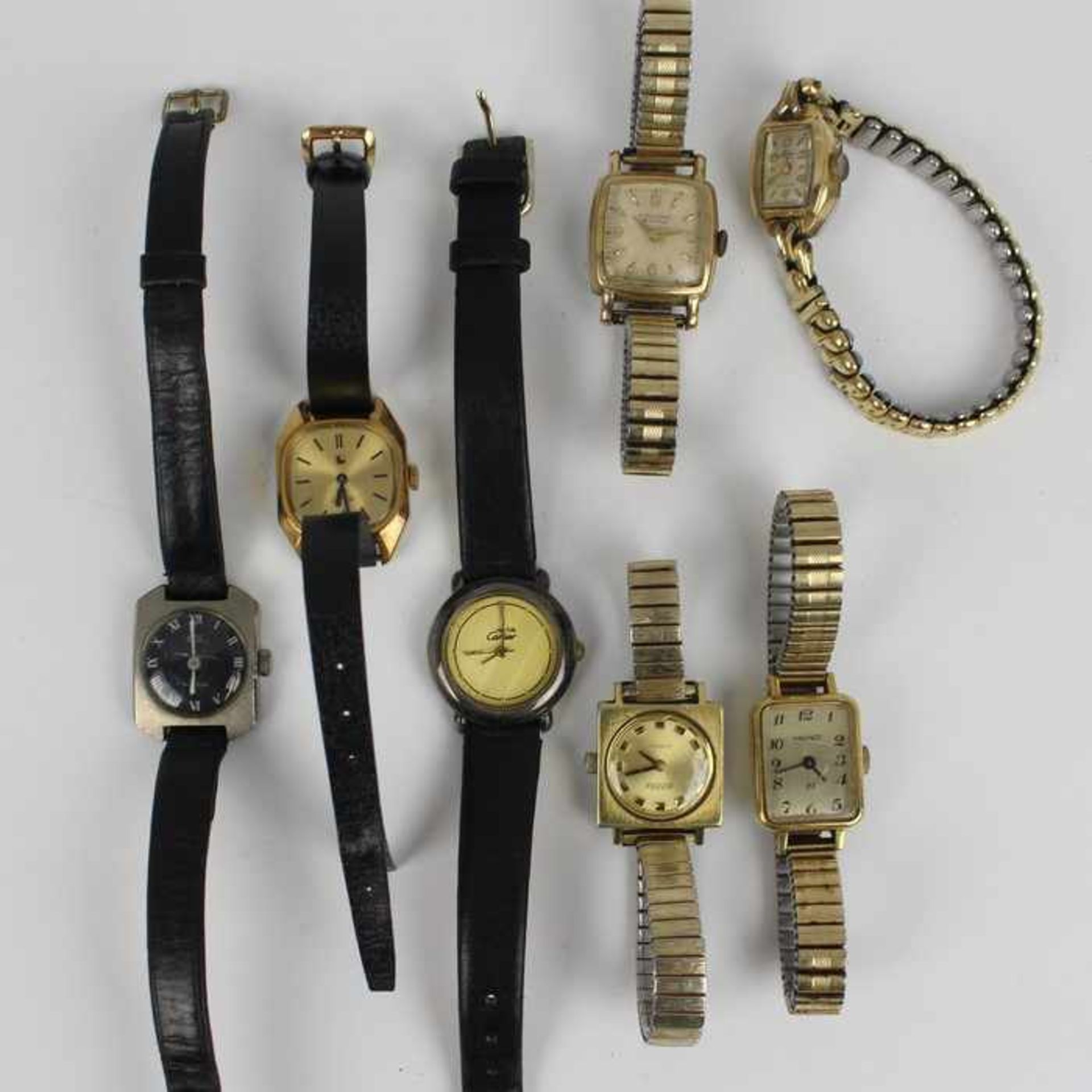Konvolut7 Armbanduhren, Junghans, Roamer u.a., tlw. Flexarmband, tlw. besch.