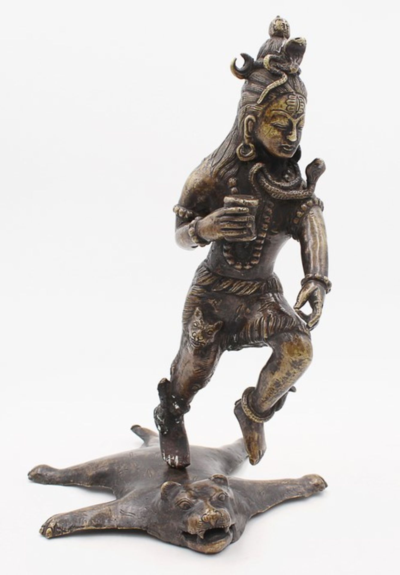 Figur - Hinduismus20.Jh., Bronze, patiniert, vollplastische Figur v. auf dem Tigerfell tanzenden