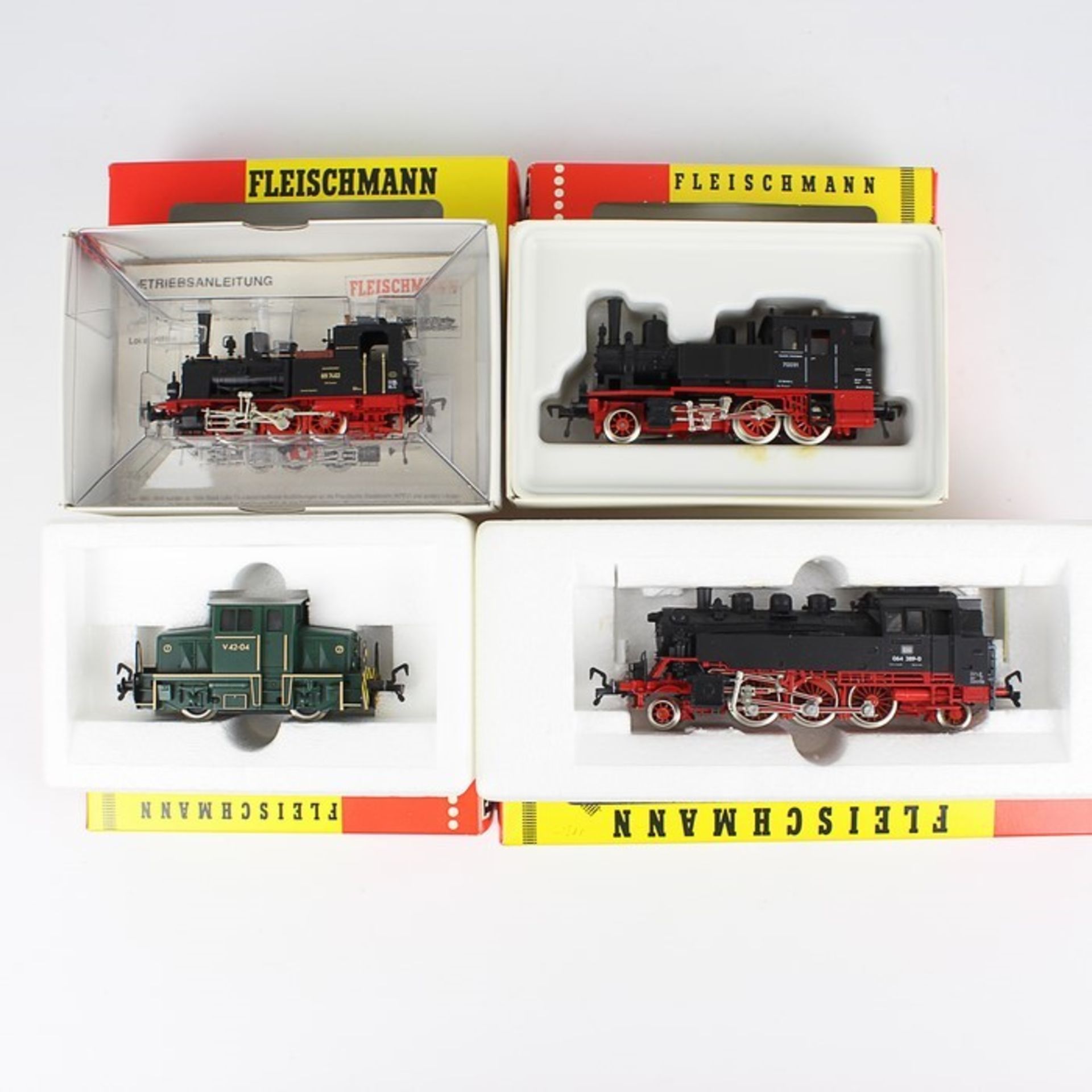 Fleischmann - Eisenbahn4 T., H0; 1x Dampflok 4064, BR 064 389-0 DB; 1x Dampflok 4010, BR 89 7462 DR;