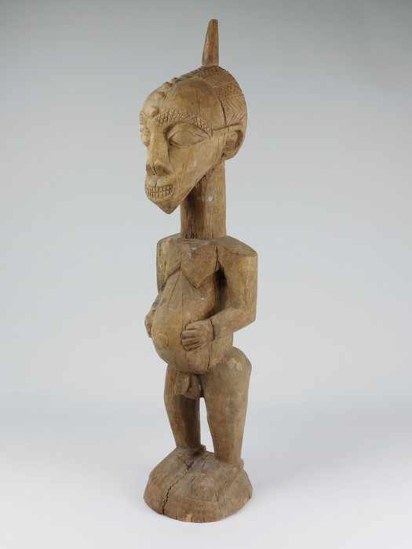 Holzfigur20.Jh., Elfenbeinküste, Baule, vollplastische Holzschnitzerei, stilisierte männliche