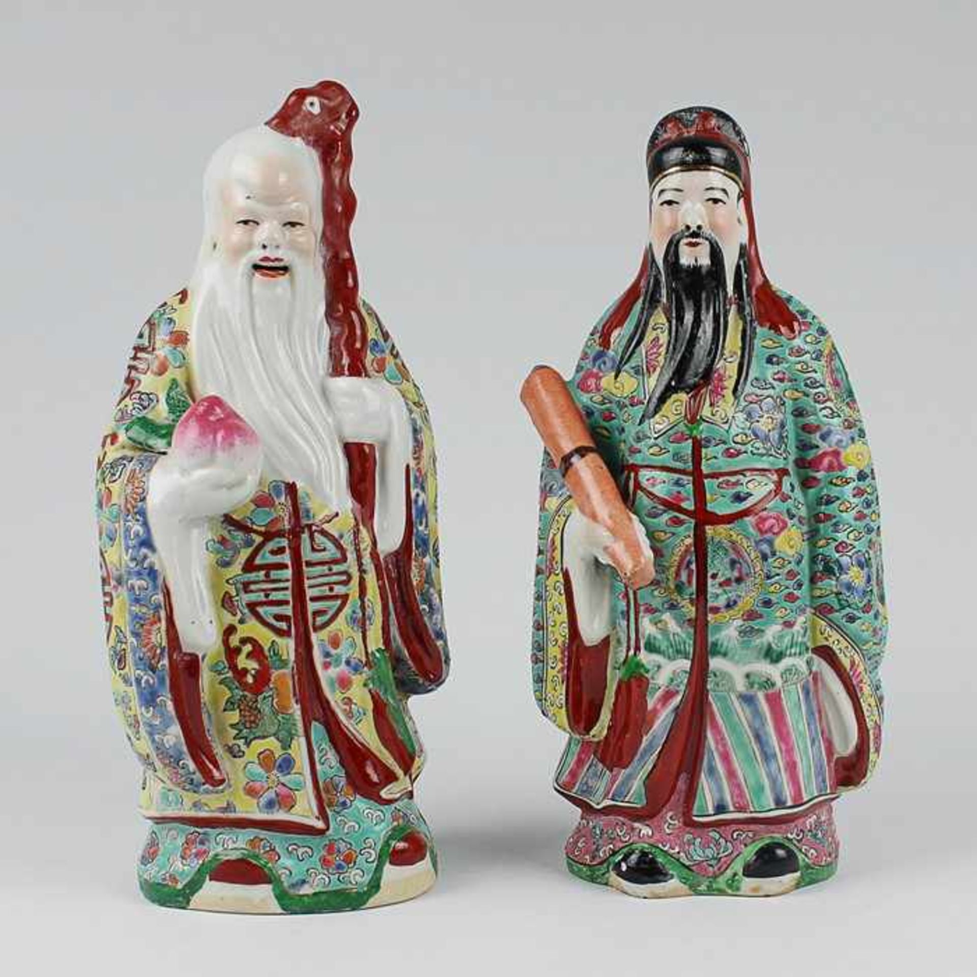 Figuren2 St., 20.Jh., China, ungem., Porzellan, polychrom bemalt, vollplastische Figure,. zwei