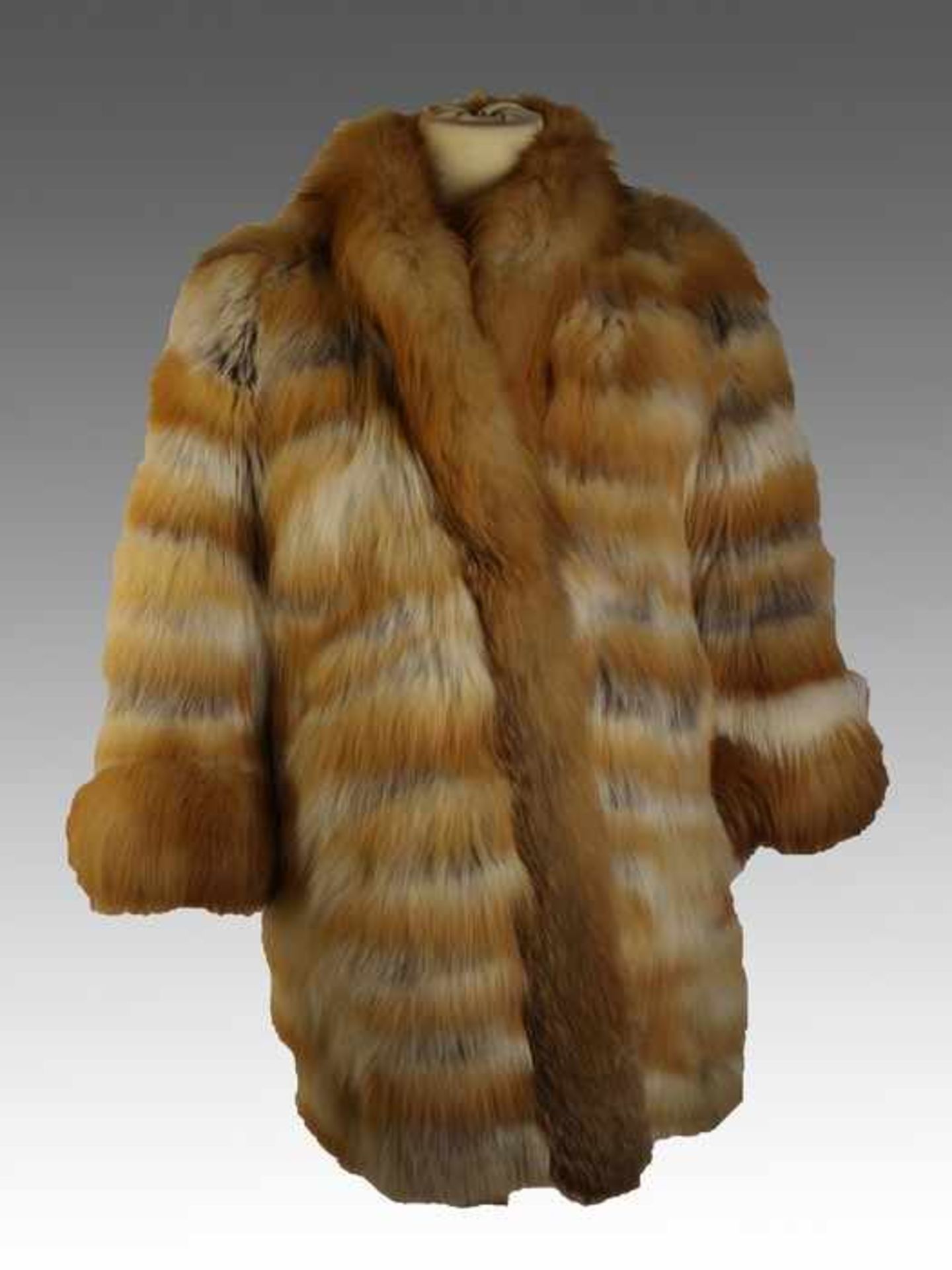 Pelzjackekanadischer Fuchs, braun, weiß, lange Form, an Schulter etwas eingerissen, ca. Gr. 40/42,
