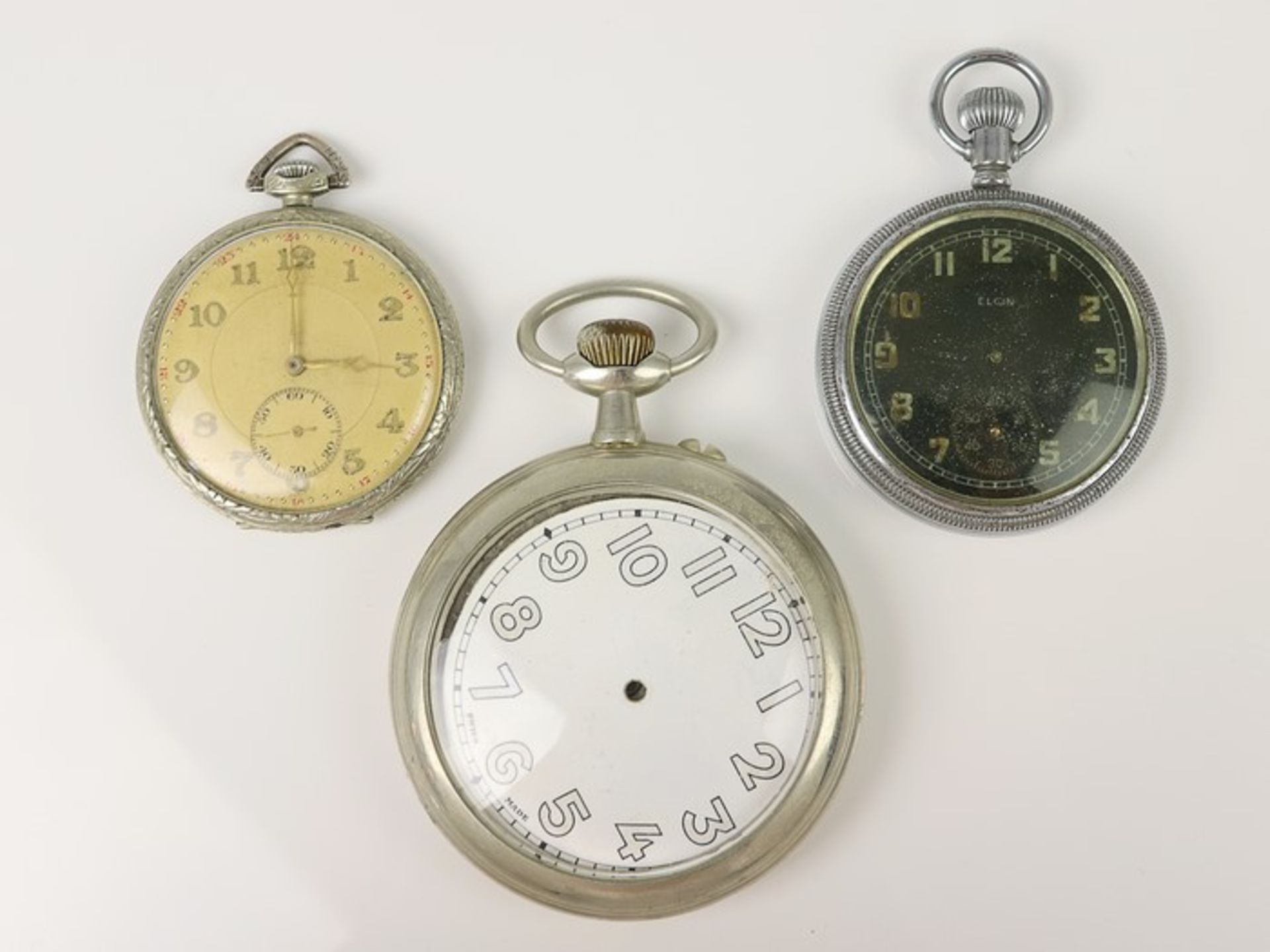 Taschenuhren3 St., 1x Eisenbahneruhr Doxa, 1x Militär-Uhr, um 1942, verschraubt, sign. Elgin (USA)