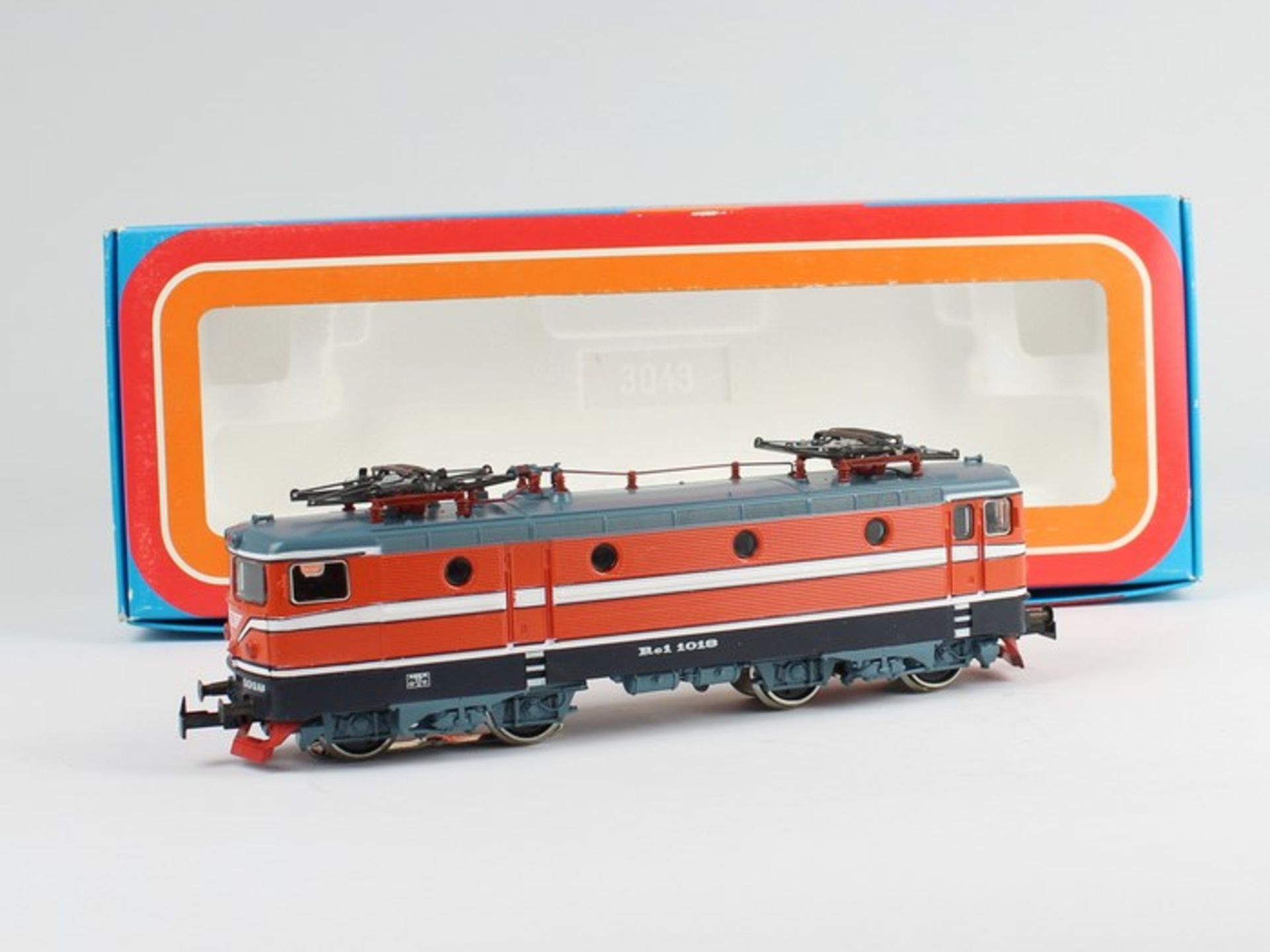Märklin - EisenbahnH0, 3043, BR Rc1 1018, orange Elektrolokomotive, Fkt. ungepr., unbesp., OK- - -
