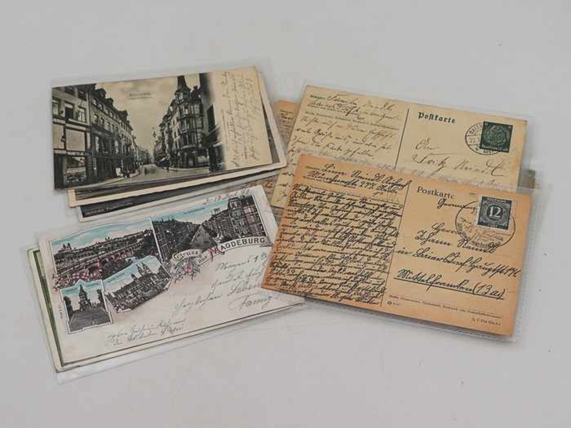 Postkartenab ca. 1910, 13 St., s./w. u. farb. lithogr., tlw. Ganzsachen, Gruss aus Magdeburg, AK