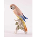 Vogelfigur Sittich, Karl Ens Vokstedtauf naturalistischem Sockel sitzend, farbig staffiert, unterm
