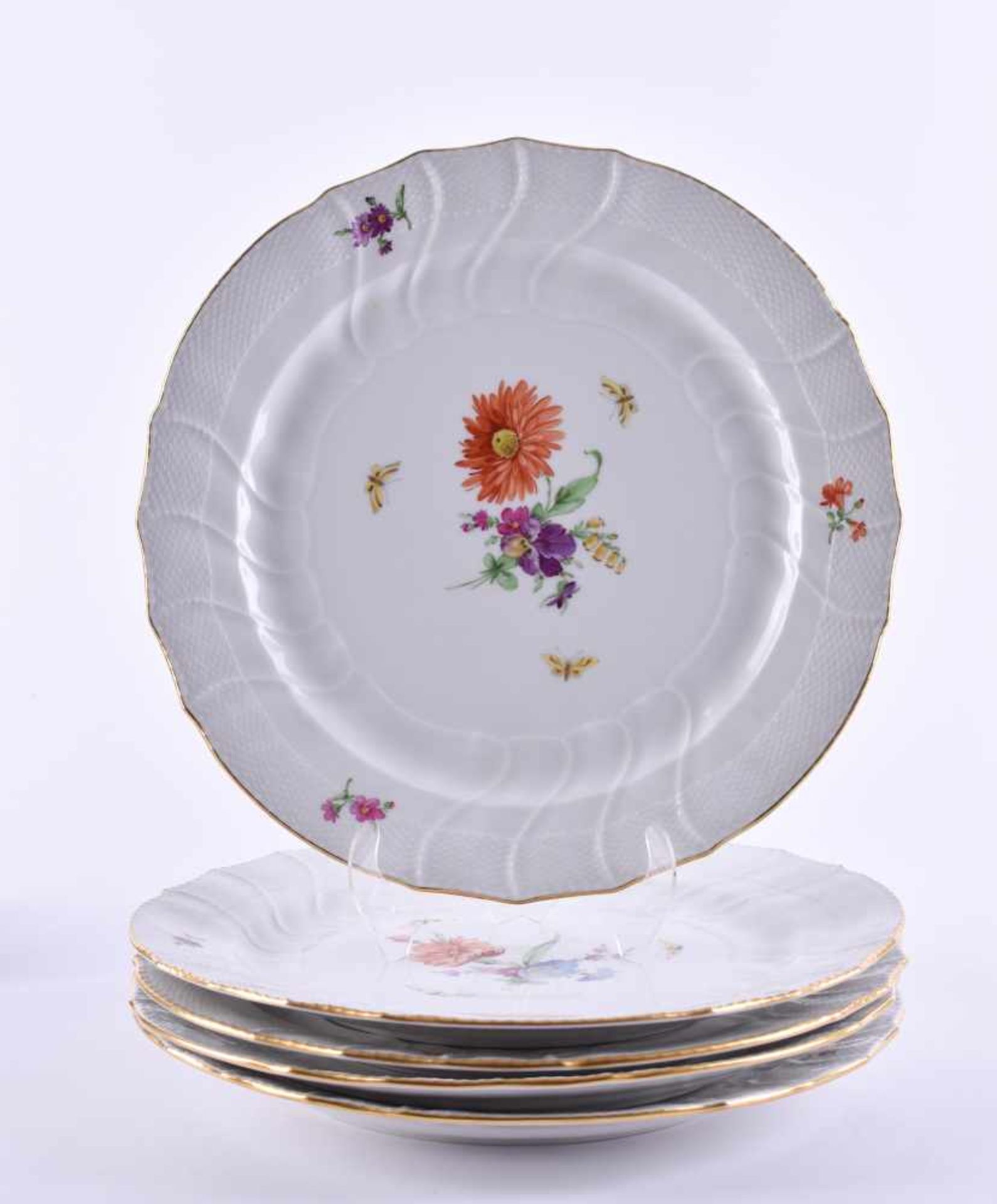 5 plates KPM Berlin 1962-1992colored and gold decorated with floral and butterfly decoration, blue