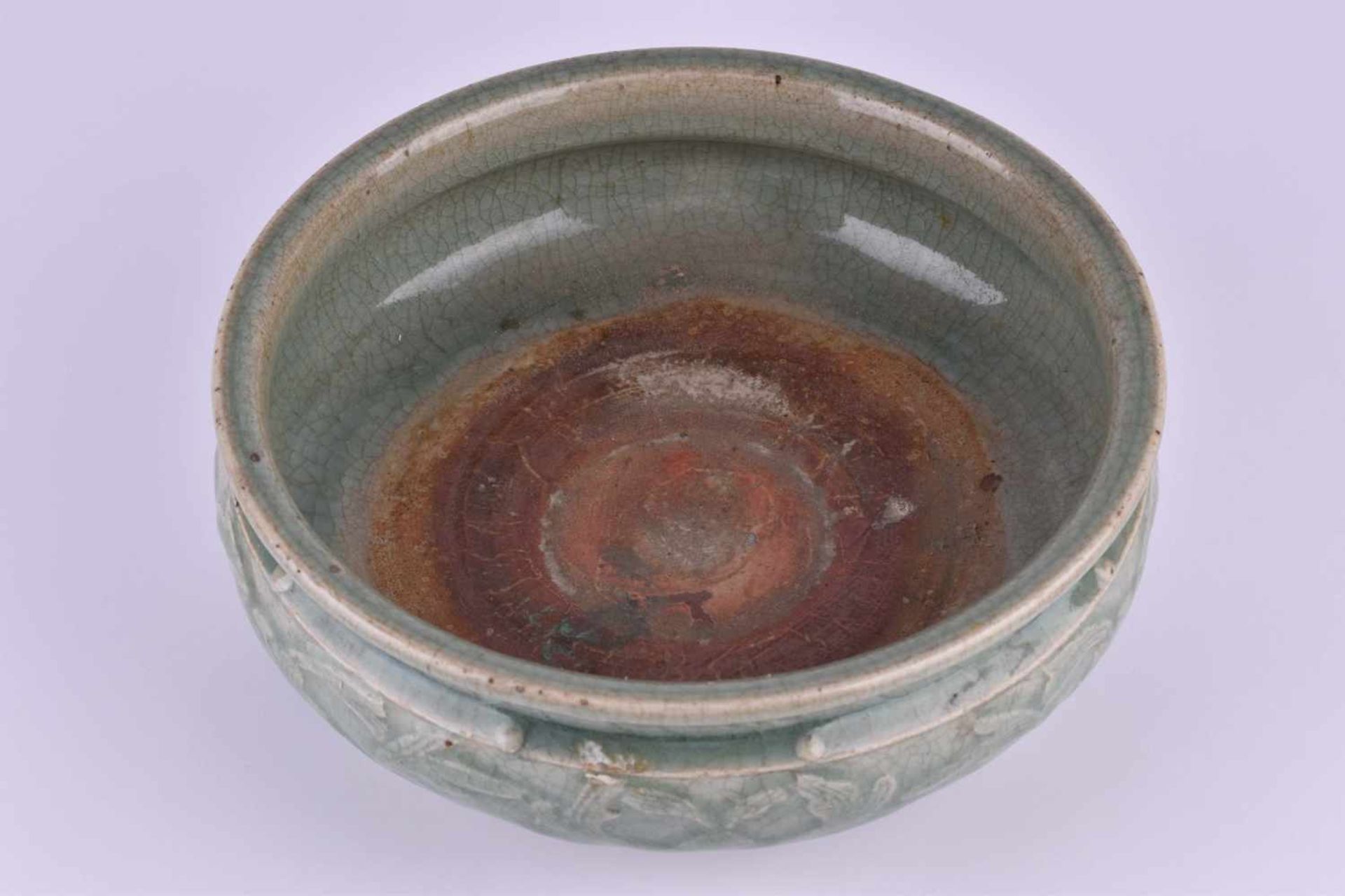 Celadon bowl China Ming periodceladon glaze, all around decorated with reliefed floral decoration, - Image 4 of 5