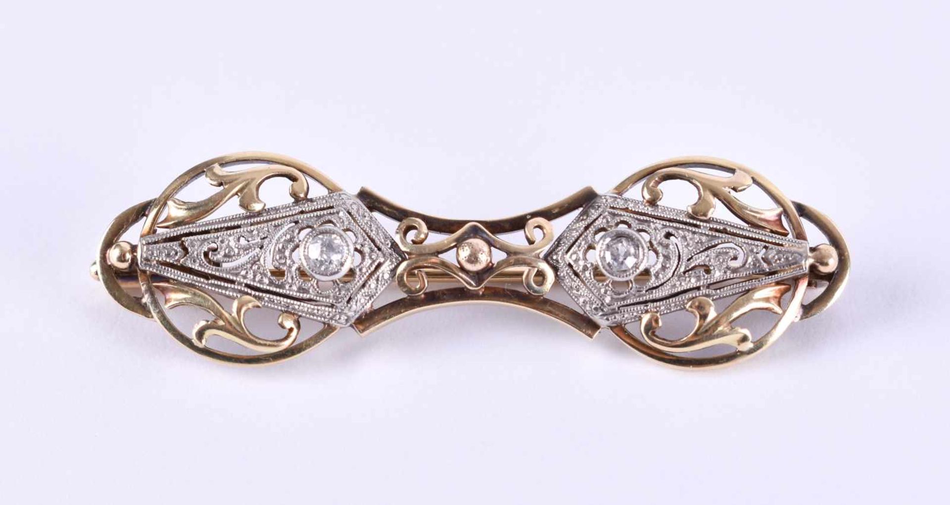 Art Deco brilliant broochyellow gold / white gold 585/000, 45 mm x 10 mm, set with 2 small diamonds,