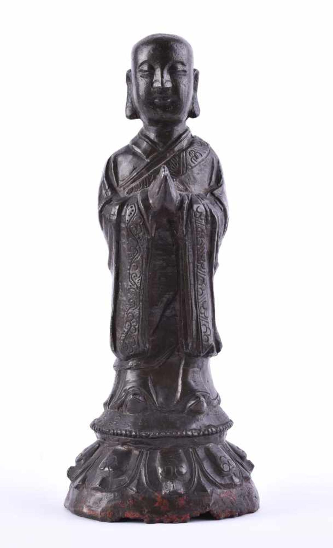 Figure of an Ananda, China Ming dynastyheavy bronze with dark patina, the youthful Ananda in a