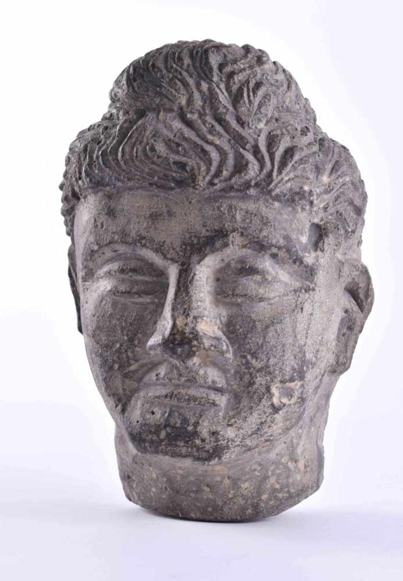 Gandhara head (2nd - 3rd century after Christ)slate, finely carved, about 13.8 cm x 9.2 cm x 7.3