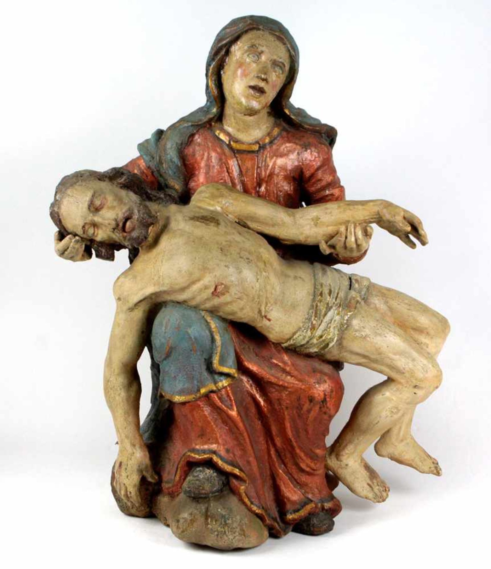 Maria mit JesusObstholz von Hand beschnitzt, teils angesetzt u. farbig gefasst, Mittelteil aus einer