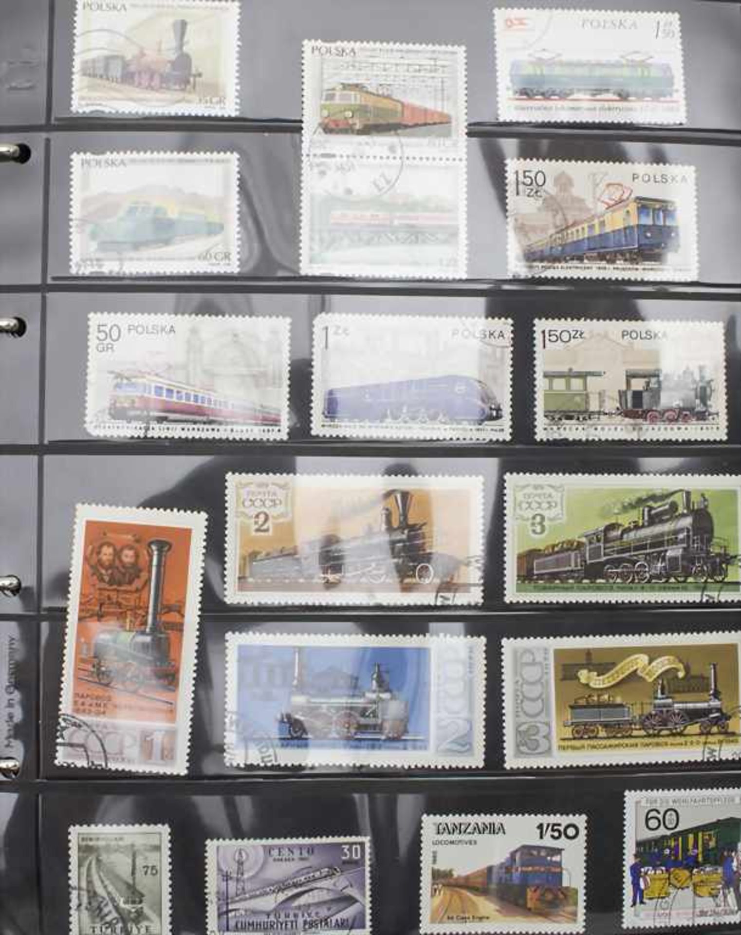 Briefmarkensammlung / A stamp collection1 Album Motivsammlung: 38 Marken 'Eisenbahn', über 300