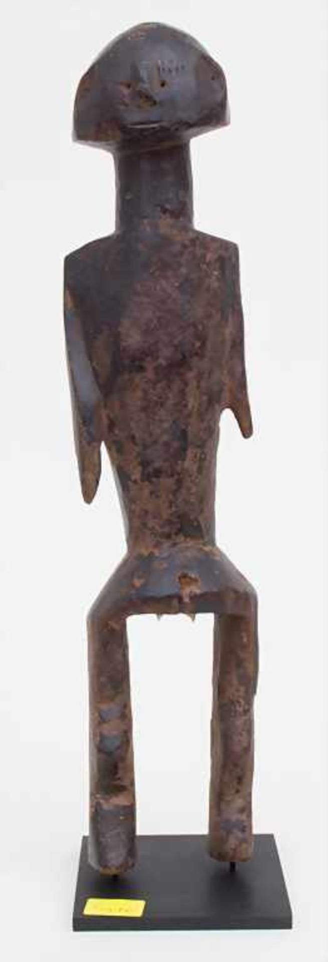 Ahnenfigur / An ancestors figurine, Bagirmi, Benue, NigeriaMaterial: Holz, dunkelbraun patiniert,