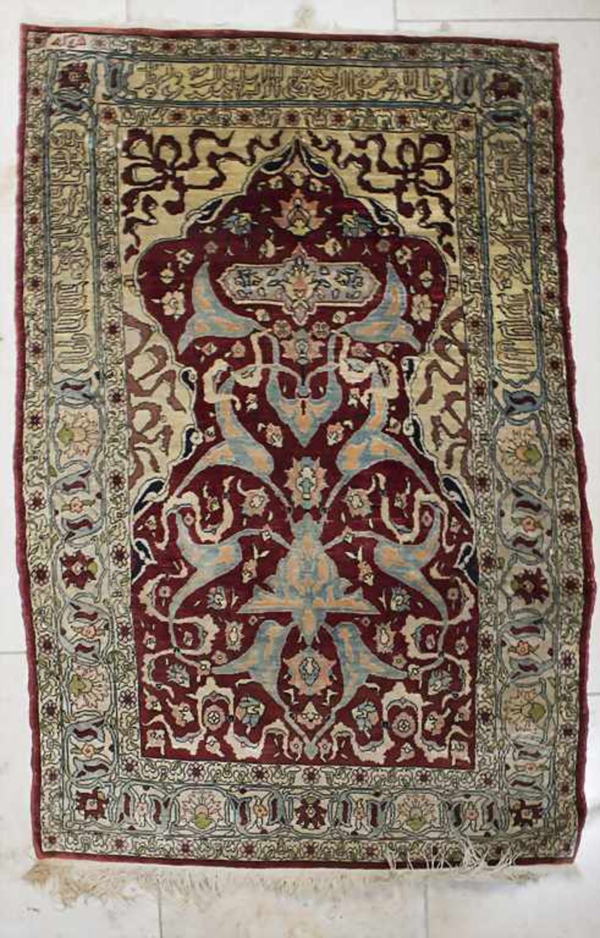 Seidenteppich 'Hereke' mit arabischer Schrift / A silk carpet 'Hereke' with arabic