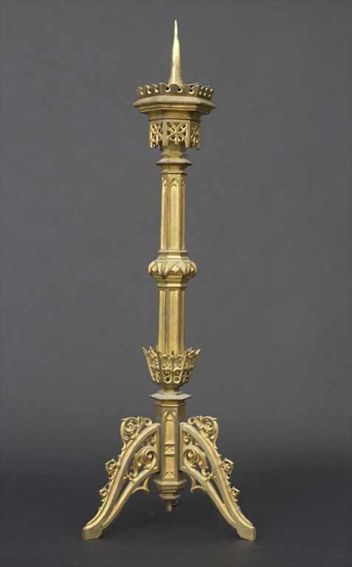 Altarleuchter / An altar candle holder, 1879Material: Bronze vergoldet, Stifterinschrift,Höhe: 57