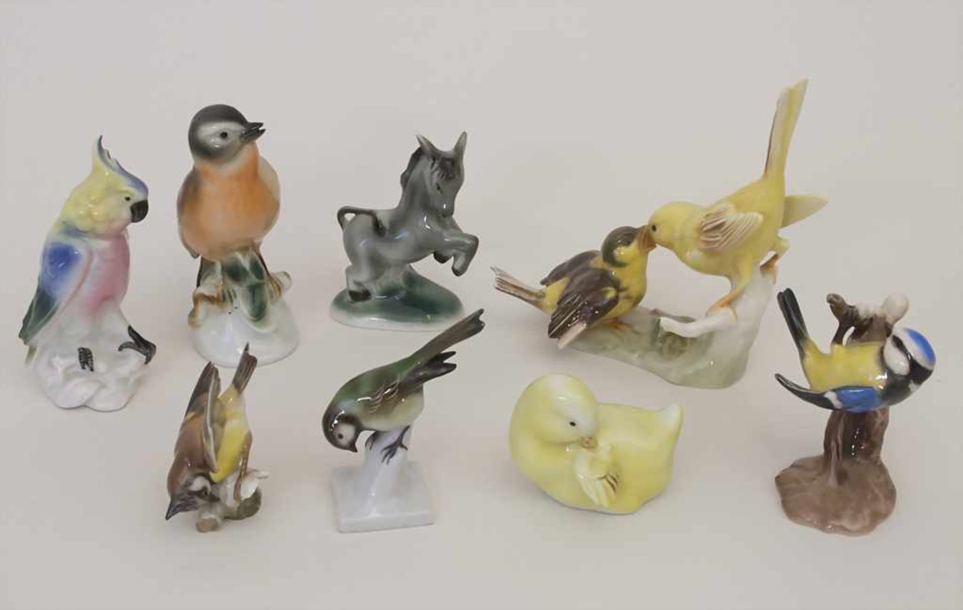 Konvolut 8 Tierfiguren / A collection of 8 animals, deutsch, 20. Jh.Material: Porzellan, polychrom