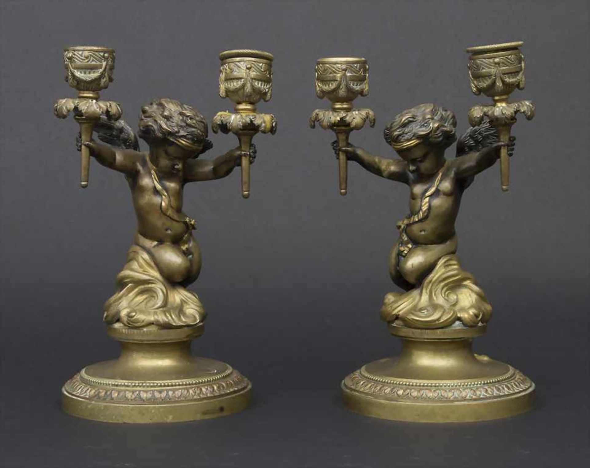 Paar figürliche Bronzeleuchter / A pair of candle sticks, Frankreich, 19. Jh.Material: Bronze mit