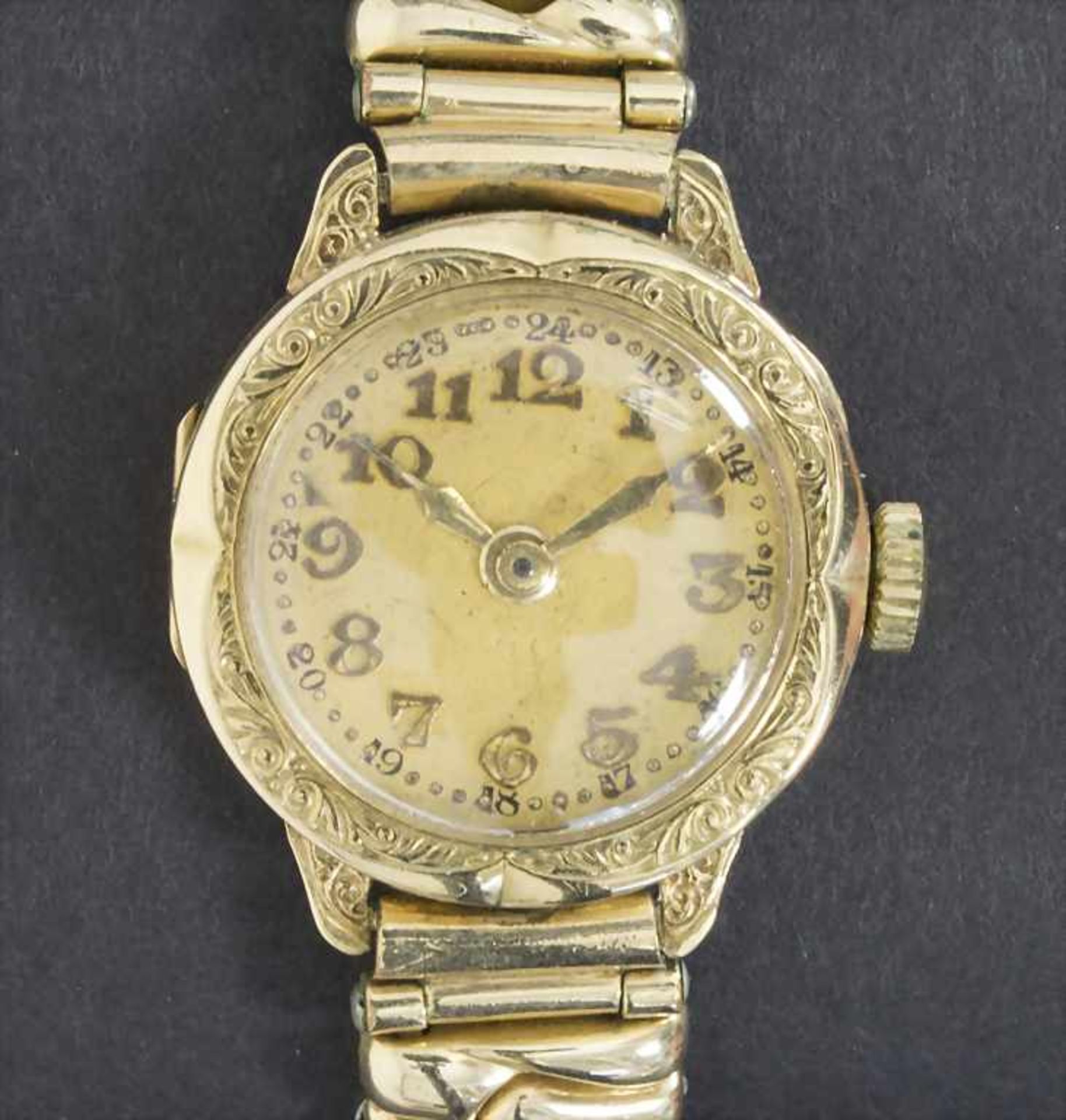 Damenarmbanduhr / A ladies wrist watch, Schweiz um 1935Gehäuse: GG 585/000 14 Kt, Armband