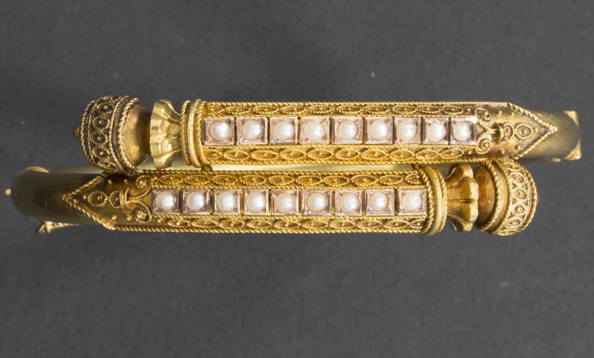 Armreif / A bracelet, 20 Jh.Material: 14 kt 585/000 Gold, Saatperlen,Maße: D. 7,0 cm, Gewicht: 14,
